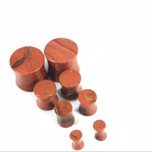 9/16”-0-2g Pair: ORGANIC Red Stone Saddle Plugs